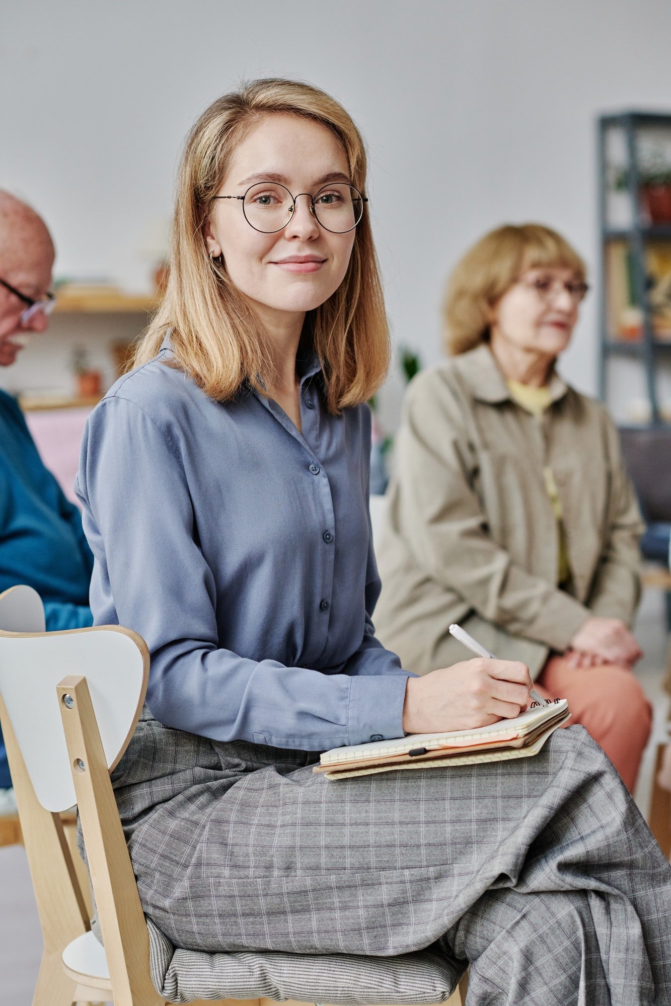 Young woman sitting at therapy